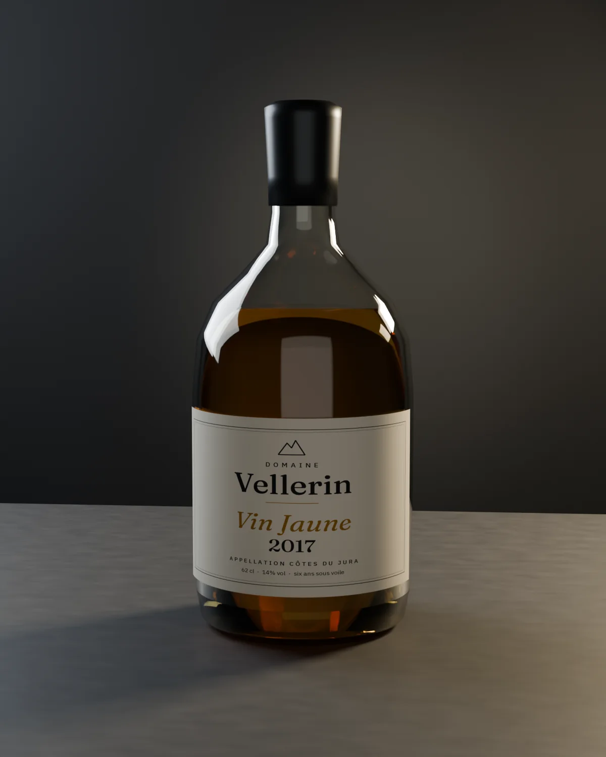 A squat clavelin bottle of Domaine Vellerin Vin Jaune 2017, golden wine behind a cream label, on dark slate